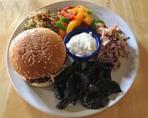 Beet burger with beet chips and slaw.