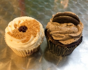 One lemon cupcake and one Oreo cupcake.