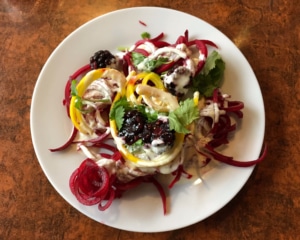 Raw beetroot pasta with cashew sauce.